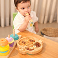 Load image into Gallery viewer, A kid with purely mama's coby the monkey bamboo suction plate